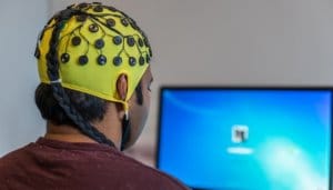 man using neurofeedback at home