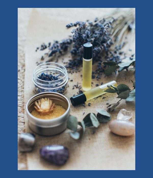 essential-oils-herbs-blue-background